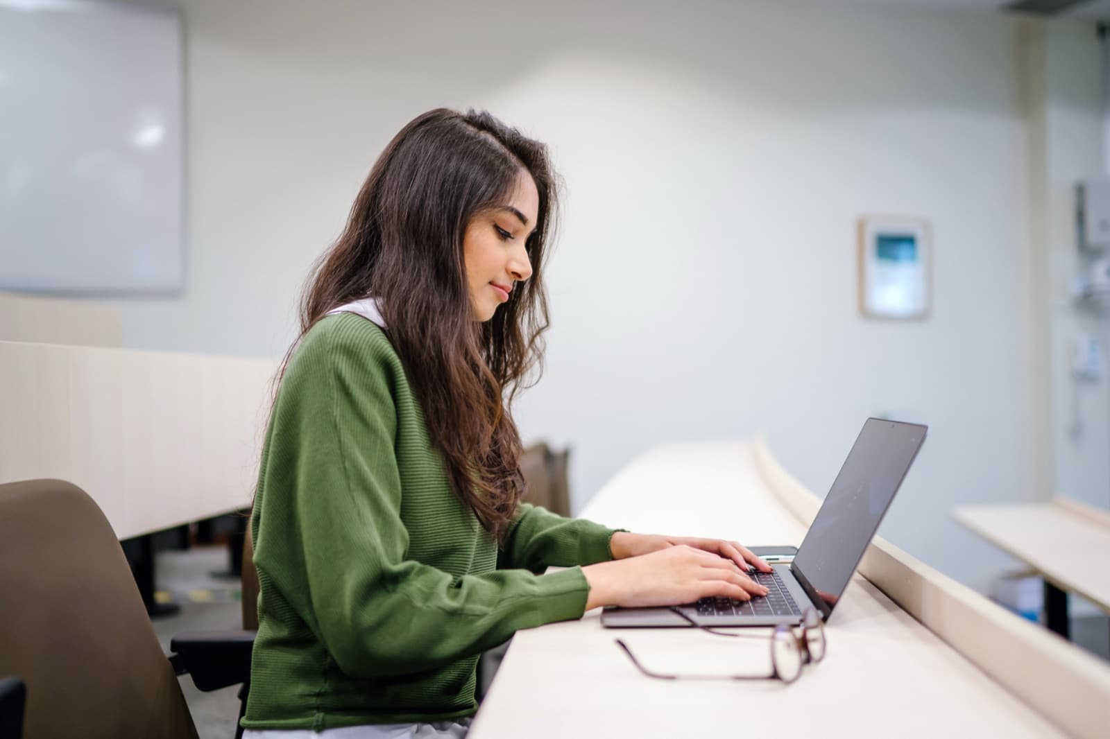 Student working on her laptop